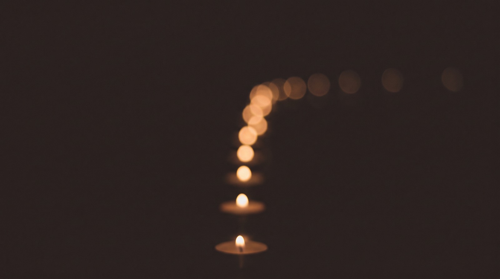 A receding row of small warm lights
